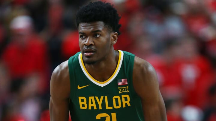 Mar 9, 2024; Lubbock, Texas, USA;  Baylor Bears forward Yves Missi (21) waits for the opening tip against the Texas Tech Red Raiders at United Supermarkets Arena. Mandatory Credit: Michael C. Johnson-USA TODAY Sports