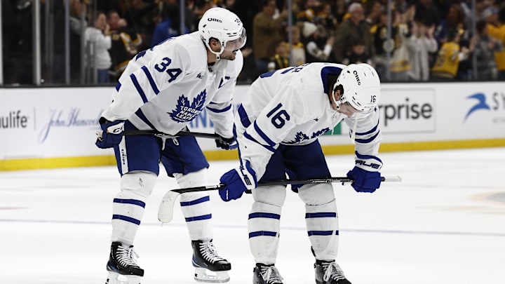 Oct 26, 2024; Boston, Massachusetts, USA; Toronto Maple Leafs right wing Mitch Marner (16) and center Auston Matthews (34) hang their heads after their 4-3 loss in overtime to the Boston Bruins at TD Garden. Mandatory Credit: Winslow Townson-Imagn Images