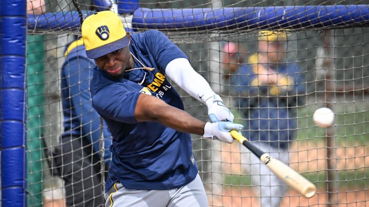 Milwaukee Brewers outfielder Luis Lara takes batting practice during spring training.