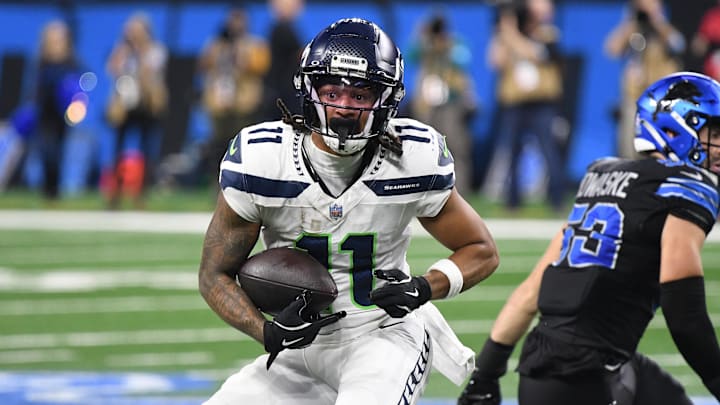 Sep 30, 2024; Detroit, Michigan, USA; Seattle Seahawks wide receiver Jaxon Smith-Njigba (11) runs the ball against the Detroit Lions in the third quarter at Ford Field. Mandatory Credit: Eamon Horwedel-Imagn Images