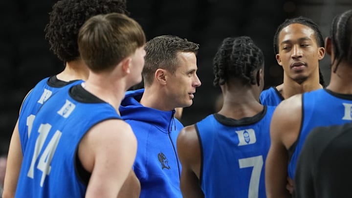 Mar 18, 2026; Greenville, SC, USA; Duke Blue Devils head coach Jon Scheyer in the huddle during a practice session ahead of the first round of the men's 2026 NCAA Tournament at Bon Secours Wellness Arena. Mandatory Credit: Bob Donnan-Imagn Images