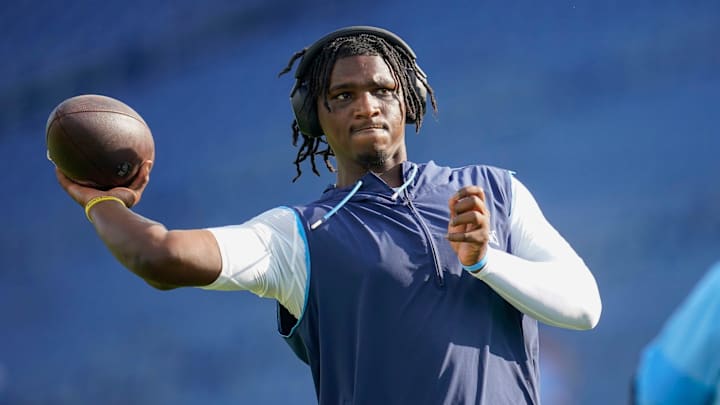 Tennessee Titans quarterback Cam Ward (1) warms up before an NFL pre-season game against the Vikings at Nissan Stadium in Nashville, Tenn., Friday, Aug. 22, 2025.