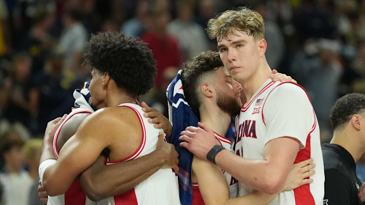 Apr 4, 2026; Indianapolis, IN, USA; Arizona Wildcats forward Koa Peat (10) and Arizona Wildcats center Motiejus Krivas (13) react in the second half during a semifinal of the Final Four of the men's 2026 NCAA Tournament against the Michigan Wolverines at Lucas Oil Stadium. Mandatory Credit: Robert Deutsch-Imagn Images