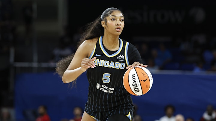 Chicago Sky forward Angel Reese (5) looks to pass the ball against the Las Vegas Aces during the first half at Wintrust Arena. 