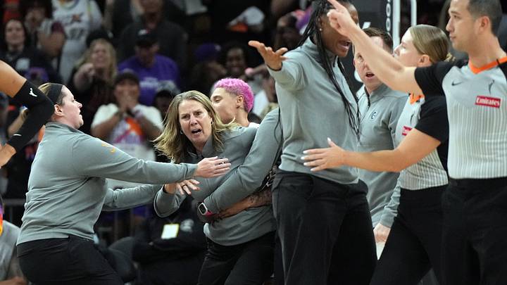 Minnesota Lynx head coach Cheryl Reeve is held back after being ejected during game three against the Phoenix Mercury of the second round for the 2025 WNBA Playoffs at PHX Arena.