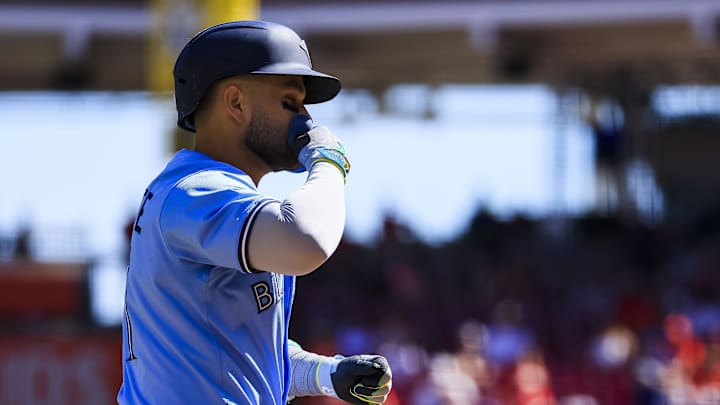 Sep 1, 2025; Cincinnati, Ohio, USA; Toronto Blue Jays shortstop Bo Bichette (11) reacts after hitting a two-run home run in the ninth inning against the Cincinnati Reds at Great American Ball Park. Mandatory Credit: Katie Stratman-Imagn Images