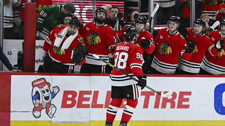 Dec 29, 2024; Chicago, Illinois, USA;  Chicago Blackhawks center Connor Bedard (98) celebrates his goal against the Dallas Stars during the first period at United Center. Mandatory Credit: Matt Marton-Imagn Images