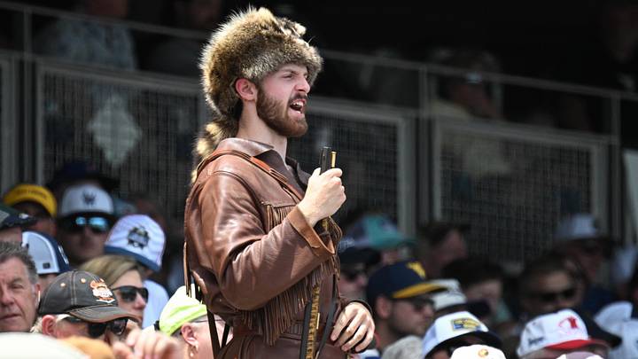 Jun 16, 2026; Omaha, NE, USA; The West Virginia Mountaineers mascot reacts to a play during the game against the Troy Trojans at Charles Schwab Field. Mandatory Credit: Steven Branscombe-Imagn Images Jun 16, 2026; Omaha, NE, USA; The West Virginia Mountaineers mascot reacts to a play during the game against the Troy Trojans at Charles Schwab Field. Mandatory Credit: Steven Branscombe-Imagn Images