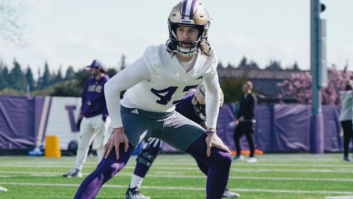 Punter Adam Saul stretches out in 2024 spring ball. 