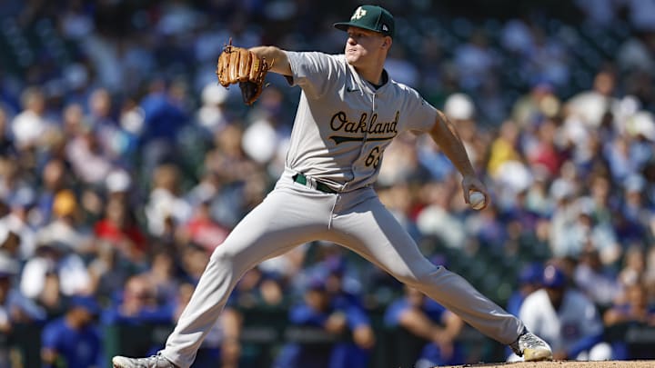 Sep 18, 2024; Chicago, Illinois, USA; Oakland Athletics starting pitcher Brady Basso (66) delivers a pitch against the Chicago Cubs during the first inning at Wrigley Field. Mandatory Credit: Kamil Krzaczynski-Imagn Images