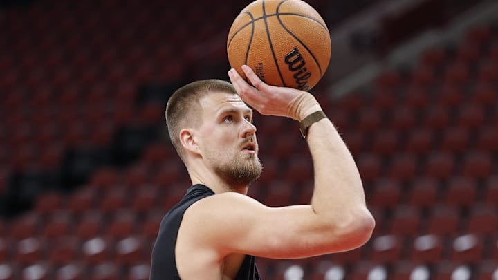 Oct 27, 2025; Chicago, Illinois, USA; Atlanta Hawks center Kristaps Porzingis (8) warms up before an NBA game against the Chicago Bulls at United Center. Mandatory Credit: Kamil Krzaczynski-Imagn Images Oct 27, 2025; Chicago, Illinois, USA; Atlanta Hawks center Kristaps Porzingis (8) warms up before an NBA game against the Chicago Bulls at United Center. Mandatory Credit: Kamil Krzaczynski-Imagn Images