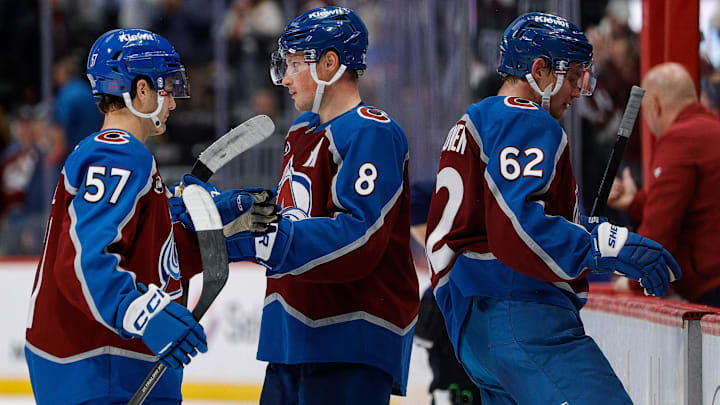 Nov 20, 2025; Denver, Colorado, USA; Colorado Avalanche defenseman Cale Makar (8) with center Tristen Nielsen (57) and left wing Artturi Lehkonen (62) after the game against the New York Rangers at Ball Arena. Mandatory Credit: Isaiah J. Downing-Imagn Images