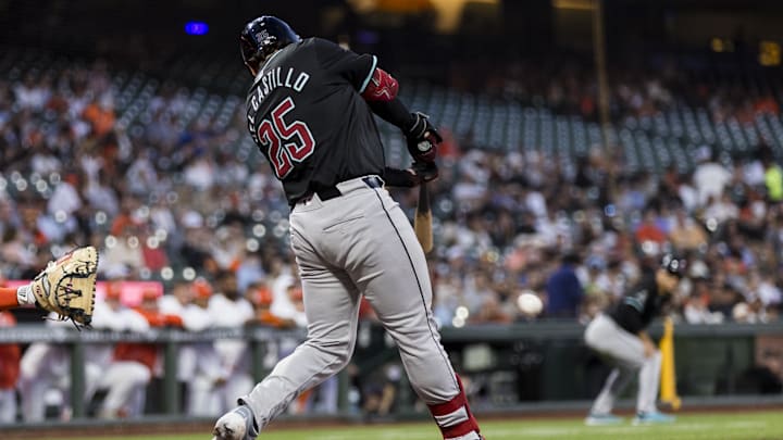 Sep 3, 2024; San Francisco, California, USA;  Arizona Diamondbacks catcher Adrian Del Castillo (25) hits a single against the San Francisco Giants during the third inning at Oracle Park. Mandatory Credit: John Hefti-Imagn Images