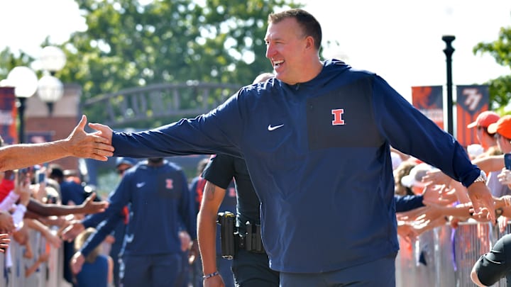 Aug 29, 2025; Champaign, Illinois, USA; Illinois Fighting Illini head coach Bret Bielema leads his team during the Illini Walk before an NCAA football game against the Western Illinois Leathernecks at Memorial Stadium. Mandatory Credit: Ron Johnson-Imagn Images Aug 29, 2025; Champaign, Illinois, USA; Illinois Fighting Illini head coach Bret Bielema leads his team during the Illini Walk before an NCAA football game against the Western Illinois Leathernecks at Memorial Stadium. Mandatory Credit: Ron Johnson-Imagn Images