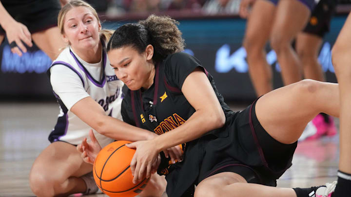 ASU Sun Devils forward McKinna Brackens 921) fights for a loose ball with Kansas State Wildcats guard Taryn Sides (11) at Desert Financial Arena in Tempe on Feb. 1, 2026. ASU Sun Devils forward McKinna Brackens 921) fights for a loose ball with Kansas State Wildcats guard Taryn Sides (11) at Desert Financial Arena in Tempe on Feb. 1, 2026.