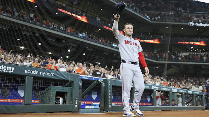 Aug 11, 2025; Houston, Texas, USA; Boston Red Sox third baseman Alex Bregman (2) waives to the crowd after being honored with a video tribute before the game against the Houston Astros at Daikin Park. Mandatory Credit: Troy Taormina-Imagn Images