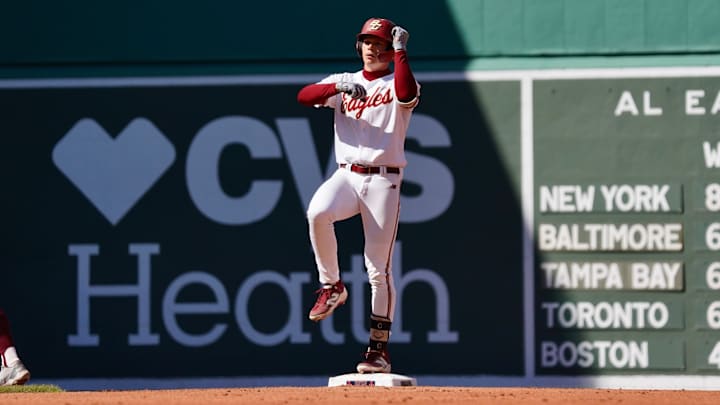 Boston College baseball right fielder Jack Toomey celebrating a double at Fenway Park. 