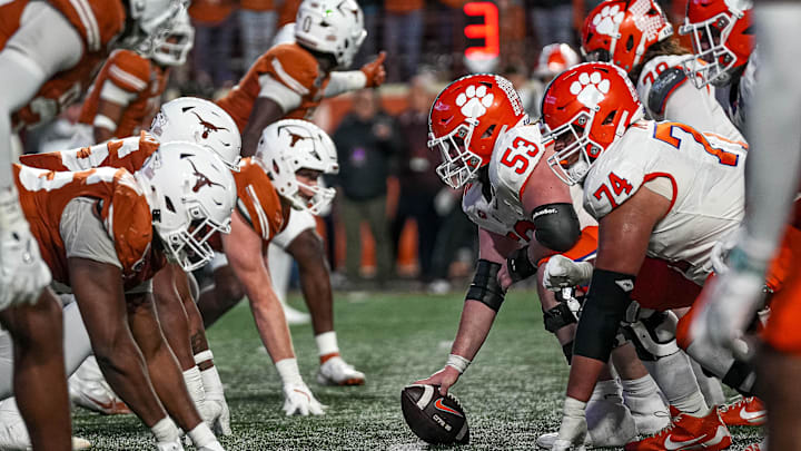 The Clemson Tigers line up for a snap during the game against the Texas Longhorns in the first round of the College Football Playoffs at Darrell K Royal-Texas Memorial Stadium on Saturday, Dec. 21, 2024.