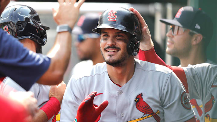 Jul 25, 2021; Cincinnati, Ohio, USA; St. Louis Cardinals third baseman Nolan Arenado (28) celebrates in the dugout after hitting a solo home run against the Cincinnati Reds during the ninth inning at Great American Ball Park. Mandatory Credit: David Kohl-Imagn Images Jul 25, 2021; Cincinnati, Ohio, USA; St. Louis Cardinals third baseman Nolan Arenado (28) celebrates in the dugout after hitting a solo home run against the Cincinnati Reds during the ninth inning at Great American Ball Park. Mandatory Credit: David Kohl-Imagn Images