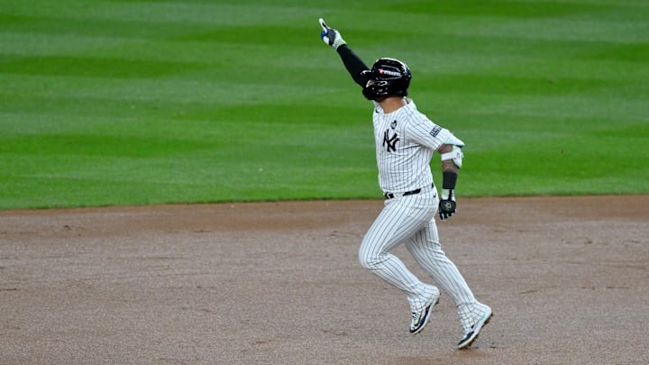 Oct 29, 2024; New York, New York, USA; New York Yankees second baseman Gleyber Torres (25) celebrates after hitting a three-run home run during the eighth inning against the Los Angeles Dodgers in game four of the 2024 MLB World Series at Yankee Stadium. Mandatory Credit: John Jones-Imagn Images Oct 29, 2024; New York, New York, USA; New York Yankees second baseman Gleyber Torres (25) celebrates after hitting a three-run home run during the eighth inning against the Los Angeles Dodgers in game four of the 2024 MLB World Series at Yankee Stadium. Mandatory Credit: John Jones-Imagn Images