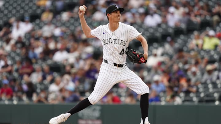 Jun 12, 2025; Denver, Colorado, USA; Colorado Rockies pitcher Jimmy Herget (44) delivers a pitch in the seventh inning against the San Francisco Giants at Coors Field. 