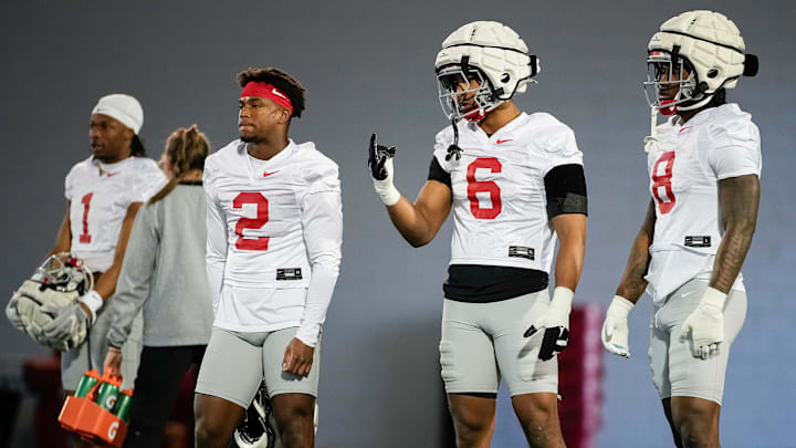 Ohio State Buckeyes linebacker Arvell Reese (8), linebacker Sonny Styles (6), safety Caleb Downs (2) and cornerback Davison Igbinosun (1) work out during spring football practice at the Woody Hayes Athletic Center on March 17, 2025.