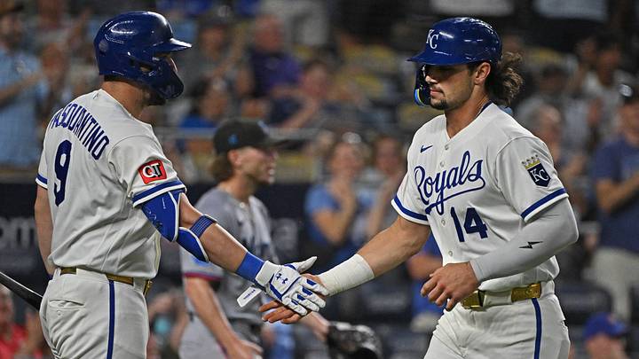 Sep 3, 2026; Kansas City, Missouri, USA; Kansas City Royals right fielder Jac Caglianone (14) gets a hand from designated hitter Vinnie Pasquantino (9) after scoring a run in the eighth inning against the Miami Marlins at Kauffman Stadium. Mandatory Credit: Peter Aiken-Imagn Images Sep 3, 2026; Kansas City, Missouri, USA; Kansas City Royals right fielder Jac Caglianone (14) gets a hand from designated hitter Vinnie Pasquantino (9) after scoring a run in the eighth inning against the Miami Marlins at Kauffman Stadium. Mandatory Credit: Peter Aiken-Imagn Images