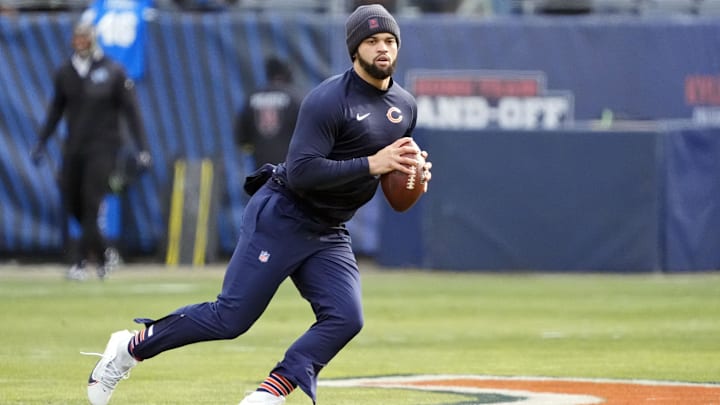 Caleb Williams gets loose during pregame warmups before the Bears' loss to the Detroit Lions.