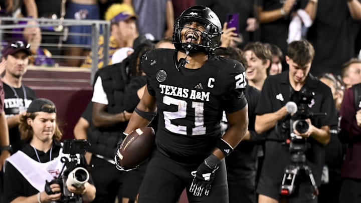 Texas A&M Aggies linebacker Taurean York (21) reacts after catching the ball for an interception in the fourth quarter against the LSU Tigers at Kyle Field. 