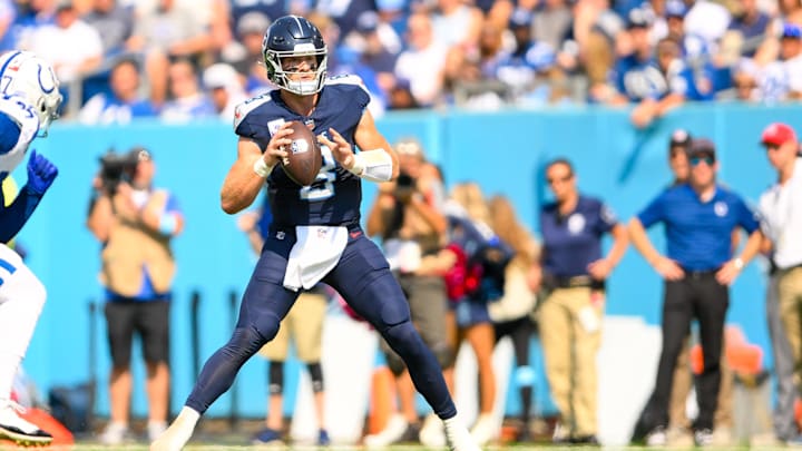 Oct 13, 2024; Nashville, Tennessee, USA;  Tennessee Titans Will Levis (8) scrambles against the Indianapolis Colts during the first half at Nissan Stadium.