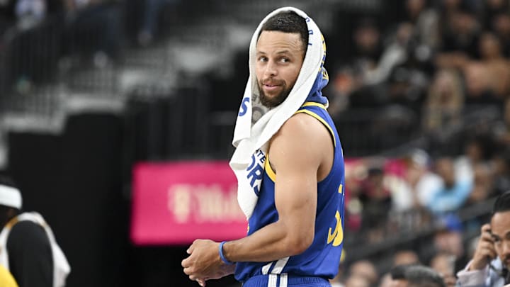 Oct 15, 2024; Las Vegas, Nevada, USA; Golden State Warriors guard Stephen Curry (30) looks on from the bench against the Los Angeles Lakers in the second quarter during a preseason game at T-Mobile Arena. Mandatory Credit: Candice Ward-Imagn Images Oct 15, 2024; Las Vegas, Nevada, USA; Golden State Warriors guard Stephen Curry (30) looks on from the bench against the Los Angeles Lakers in the second quarter during a preseason game at T-Mobile Arena. Mandatory Credit: Candice Ward-Imagn Images