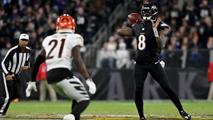 Nov 16, 2023; Baltimore, Maryland, USA; Baltimore Ravens quarterback Lamar Jackson (8) throws during the fourth quarter against the Cincinnati Bengals at M&T Bank Stadium. Mandatory Credit: Tommy Gilligan-Imagn Images