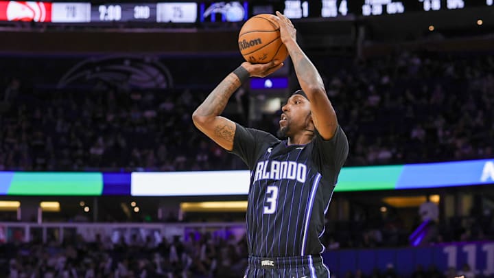 Apr 8, 2025; Orlando, Florida, USA; Orlando Magic guard Kentavious Caldwell-Pope (3) shoots a three point basket during the second half against the Atlanta Hawks at Kia Center. Mandatory Credit: Mike Watters-Imagn Images Apr 8, 2025; Orlando, Florida, USA; Orlando Magic guard Kentavious Caldwell-Pope (3) shoots a three point basket during the second half against the Atlanta Hawks at Kia Center. Mandatory Credit: Mike Watters-Imagn Images