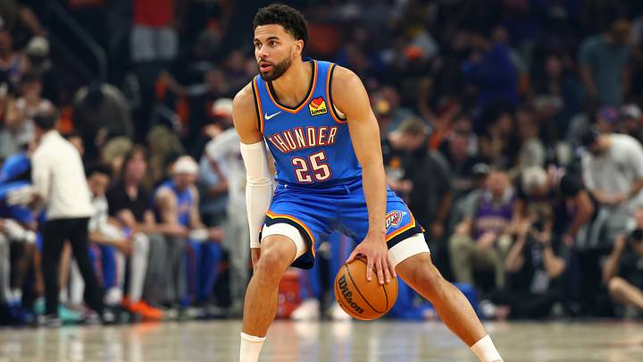 Apr 27, 2026; Phoenix, Arizona, USA; Oklahoma City Thunder guard Ajay Mitchell (25) against the Phoenix Suns during game four of the first round of the 2026 NBA Playoffs at Mortgage Matchup Center. Mandatory Credit: Mark J. Rebilas-Imagn Images