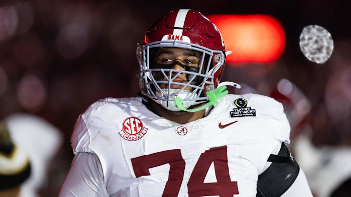 Dec 19, 2025; Norman, OK, USA; Alabama Crimson Tide offensive lineman Kadyn Proctor (74) against the Oklahoma Sooners during the CFP National Playoff First Round at Gaylord Family Oklahoma Memorial Stadium. Mandatory Credit: Mark J. Rebilas-Imagn Images