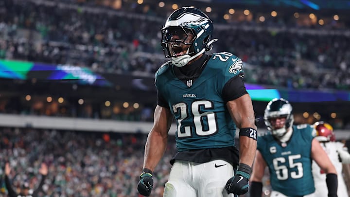 Jan 26, 2025; Philadelphia, PA, USA; Philadelphia Eagles running back Saquon Barkley (26) celebrates after a touchdown against the Washington Commanders during the second half in the NFC Championship game at Lincoln Financial Field. Mandatory Credit: Bill Streicher-Imagn Images