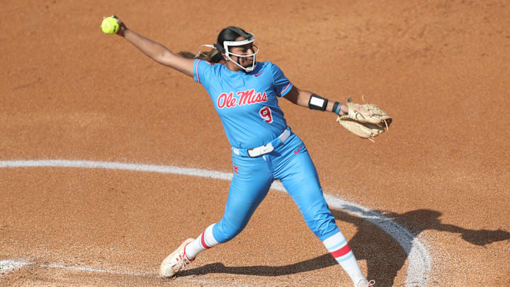 May 8, 2025; Athens, GA, USA; Ole Miss starting pitcher/relief pitcher Miali Guachino (9) pitches during a game against Texas at Jack Turner Stadium. Mandatory Credit: Mady Mertens-Imagn Images May 8, 2025; Athens, GA, USA; Ole Miss starting pitcher/relief pitcher Miali Guachino (9) pitches during a game against Texas at Jack Turner Stadium. Mandatory Credit: Mady Mertens-Imagn Images