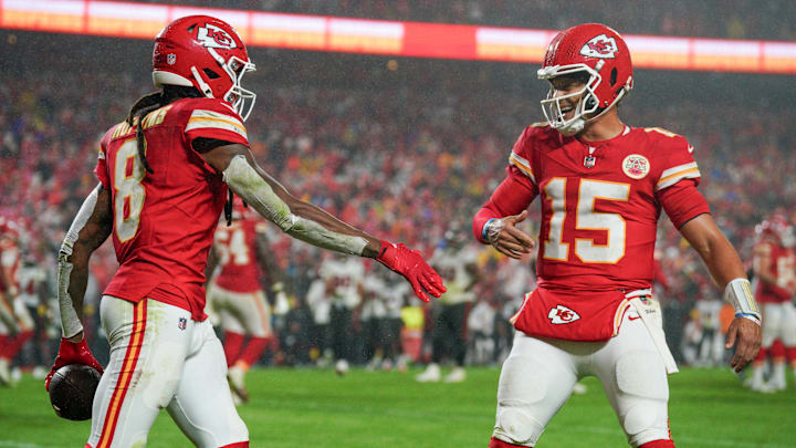Nov 4, 2024; Kansas City, Missouri, USA; Kansas City Chiefs wide receiver DeAndre Hopkins (8) celebrates with quarterback Patrick Mahomes (15) after scoring against the Tampa Bay Buccaneers during the second half at GEHA Field at Arrowhead Stadium. Mandatory Credit: Denny Medley-Imagn Images