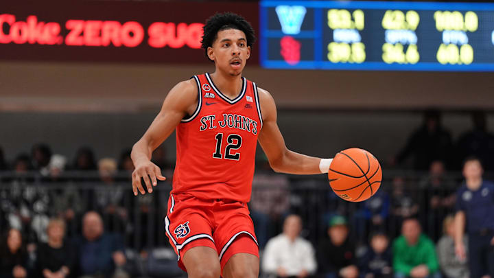Feb 12, 2025; Villanova, Pennsylvania, USA; Saint John's Red Storm guard RJ Luis Jr (12) controls the ball against the Villanova Wildcats in the second half at William B. Finneran Pavilion. Mandatory Credit: Kyle Ross-Imagn Images