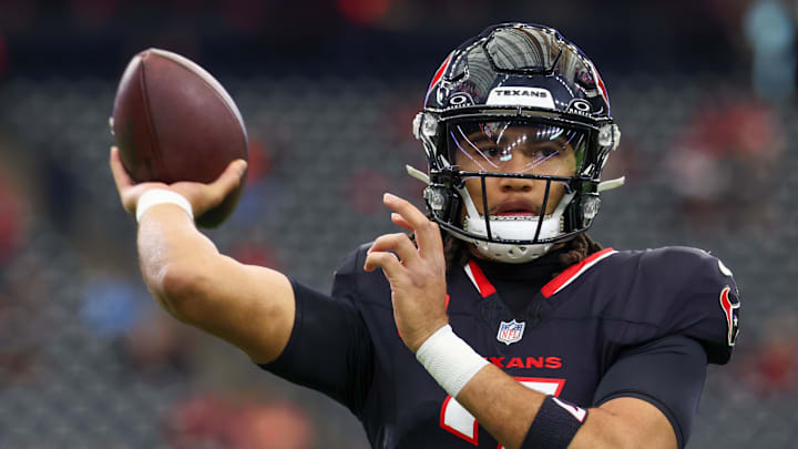 Houston Texans quarterback C.J. Stroud (7) warms up before playing against the Arizona Cardinals at NRG Stadium. 