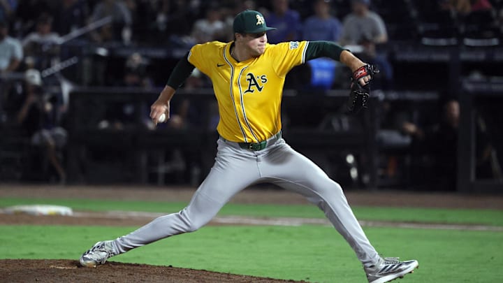 Jun 30, 2025; Tampa, Florida, USA;  Athletics pitcher Mason Miller (19) throws a pitch against the Tampa Bay Rays during the ninth inning at George M. Steinbrenner Field. Mandatory Credit: Kim Klement Neitzel-Imagn Images