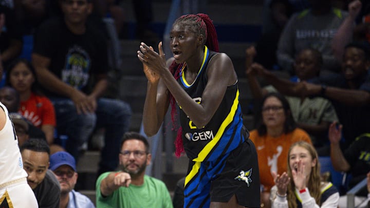Sep 29, 2023; Arlington, Texas, USA; Dallas Wings center Awak Kuier (28) claps for her team during the second half against the Las Vegas Aces during game three of the 2023 WNBA Playoffs at College Park Center. Mandatory Credit: Jerome Miron-Imagn Images Sep 29, 2023; Arlington, Texas, USA; Dallas Wings center Awak Kuier (28) claps for her team during the second half against the Las Vegas Aces during game three of the 2023 WNBA Playoffs at College Park Center. Mandatory Credit: Jerome Miron-Imagn Images