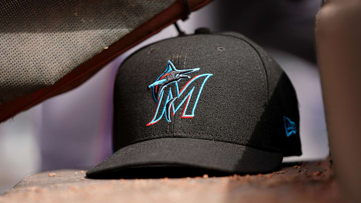 Cincinnati, OH, USA; A view of a New Era Miami Marlins hat in the dugout during the game against the Cincinnati Reds at Great American Ball Park. Cincinnati, OH, USA; A view of a New Era Miami Marlins hat in the dugout during the game against the Cincinnati Reds at Great American Ball Park.