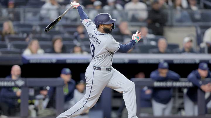 Sep 24, 2026; Bronx, New York, USA; Tampa Bay Rays third baseman Junior Caminero (13) follows through on an RBI single against the New York Yankees during the third inning at Yankee Stadium. Mandatory Credit: Brad Penner-Imagn Images Sep 24, 2026; Bronx, New York, USA; Tampa Bay Rays third baseman Junior Caminero (13) follows through on an RBI single against the New York Yankees during the third inning at Yankee Stadium. Mandatory Credit: Brad Penner-Imagn Images