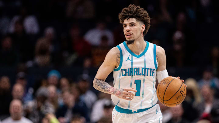 Mar 7, 2025; Charlotte, North Carolina, USA; Charlotte Hornets guard LaMelo Ball (1) brings the ball up court against the Cleveland Cavaliers during the first quarter at Spectrum Center. Mandatory Credit: Scott Kinser-Imagn Images