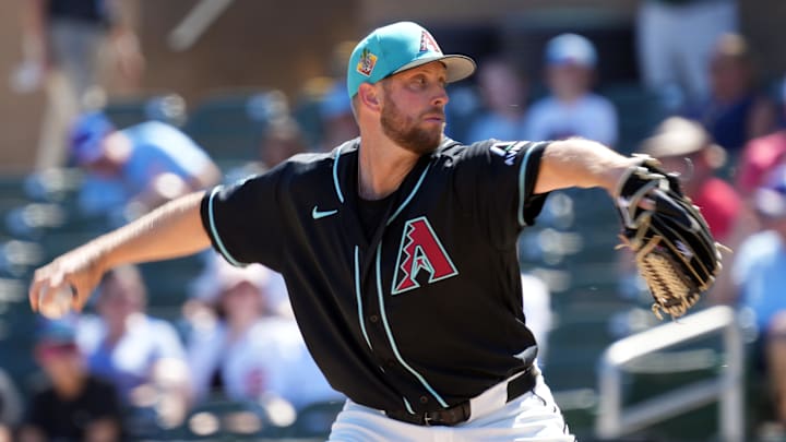 Mar 18, 2026; Salt River Pima-Maricopa, Arizona, USA; Arizona Diamondbacks pitcher Merrill Kelly (29) throws against the Chicago Cubs in the first inning at Salt River Fields at Talking Stick. Mandatory Credit: Rick Scuteri-Imagn Images