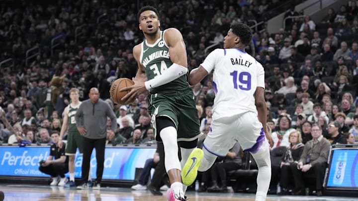 Mar 7, 2026; Milwaukee, Wisconsin, USA; Milwaukee Bucks forward Giannis Antetokounmpo (34) drives to the basket against Utah Jazz forward Ace Bailey (19) int the second half at Fiserv Forum. Mandatory Credit: Michael McLoone-Imagn Images