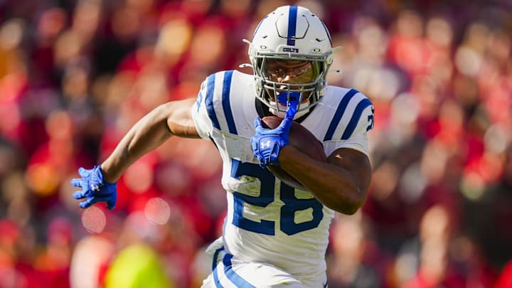 Nov 23, 2025; Kansas City, Missouri, USA; Indianapolis Colts running back Jonathan Taylor (28) runs the ball during the first half against the Kansas City Chiefs at GEHA Field at Arrowhead Stadium. 