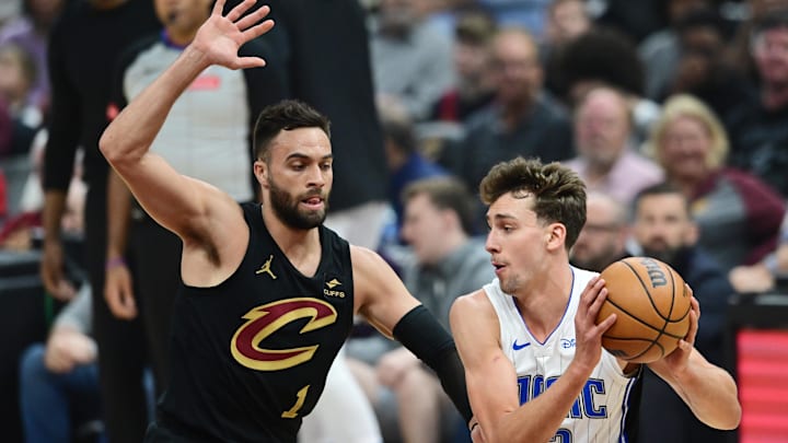Apr 30, 2024; Cleveland, Ohio, USA; Cleveland Cavaliers guard Max Strus (1) defends Orlando Magic
