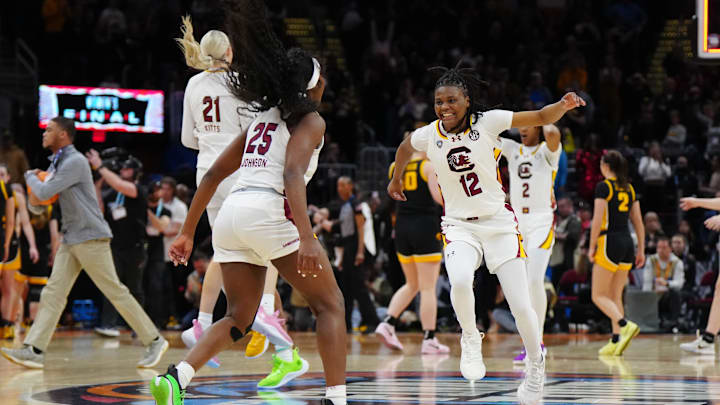 South Carolina basketball stars Raven Johnson (25), MiLaysia Fulwiley (12), Chloe Kitts (21), and Ashlyn Watkins (2)